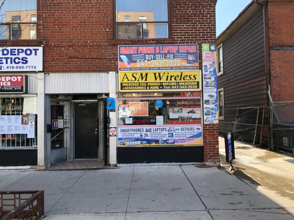 The ASM Wireless team at the shop counter